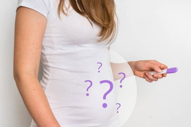 woman with questions about pregnancy.