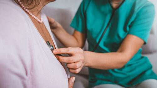 doctor checking vitals during a routine exam.