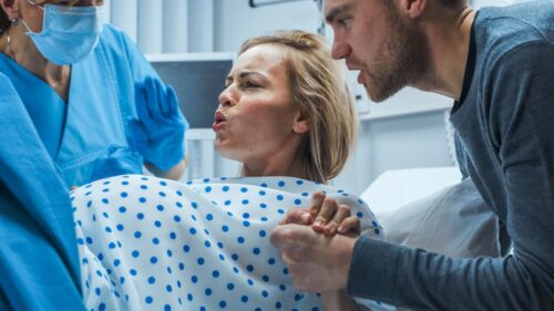 woman pushing during delivery. 