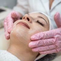 Esthetician in Idaho Falls giving a facial massage.