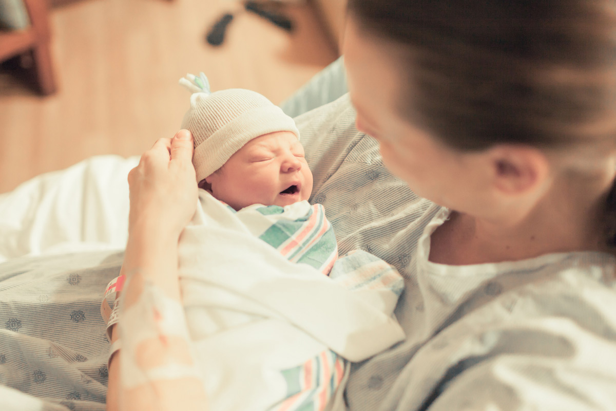 mother-holding-newborn.