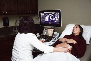 woman having an ultrasound at Rosemark facility.
